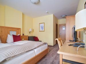 Postelja oz. postelje v sobi nastanitve Hotel Hierzegger
