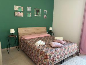 Posteľ alebo postele v izbe v ubytovaní Assajè Guestroom