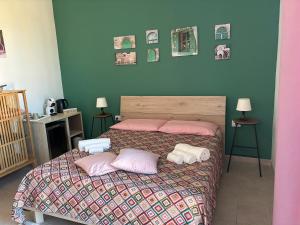 Posteľ alebo postele v izbe v ubytovaní Assajè Guestroom