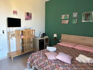 Posteľ alebo postele v izbe v ubytovaní Assajè Guestroom