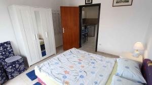 Postel nebo postele na pokoji v ubytování Apartments in Malinska - Insel Krk 14421