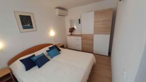 Postel nebo postele na pokoji v ubytování Apartment Porat 22