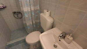 Et badeværelse på Apartment Porat 1