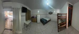 Postel nebo postele na pokoji v ubytování Recanto Pousada JU&JU com piscina COMPARTILHADA