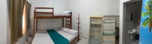 Postel nebo postele na pokoji v ubytování Recanto Pousada JU&JU com piscina COMPARTILHADA