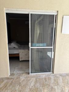 Postel nebo postele na pokoji v ubytování Recanto Pousada JU&JU com piscina COMPARTILHADA