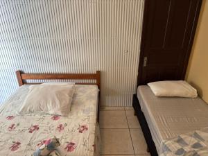 Postel nebo postele na pokoji v ubytování Recanto Pousada JU&JU com piscina COMPARTILHADA
