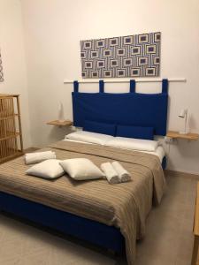Posteľ alebo postele v izbe v ubytovaní Assajè Guestroom