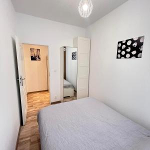 Łóżko lub łóżka w pokoju w obiekcie Stay99