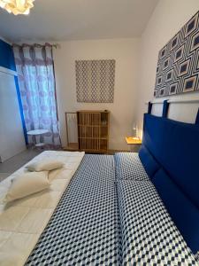 Posteľ alebo postele v izbe v ubytovaní Assajè Guestroom