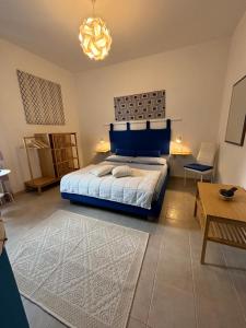Posteľ alebo postele v izbe v ubytovaní Assajè Guestroom