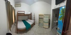 Postel nebo postele na pokoji v ubytování Recanto Pousada JU&JU com piscina COMPARTILHADA