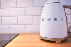 a kitchen appliance sitting on a wooden counter top at Visby innerstad St Hans in Visby