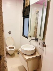 Fotografie z fotogalerie ubytování Lotus Room v destinaci Nágpur + 1 fotografie