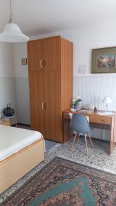 Postel nebo postele na pokoji v ubytování La Casetta di Anna