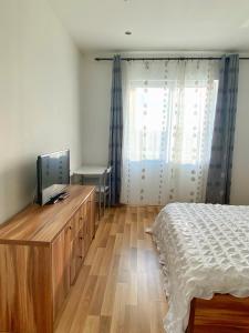 Et tv og/eller underholdning på Premier Flat with Parking