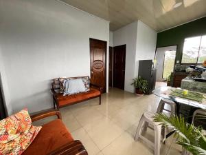 a living room with a couch and a table at Bellavista Ceci A2 in San Ramón