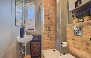 a bathroom with a shower and a sink and a toilet at Osada Pod Maliną in Brenna +21 photos
