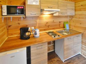 Kuchyň nebo kuchyňský kout v ubytování Single-story holiday homes with a terrace, pool