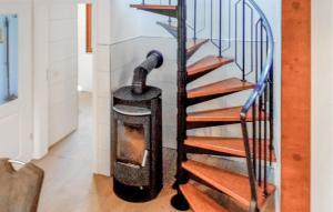 a fire extinguisher next to a staircase in a house at Ferienhaus 1 In Kirchheim in Kirchheim