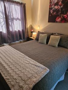 Postel nebo postele na pokoji v ubytování Di's B&B unit 2
