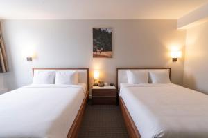 Krevet ili kreveti u jedinici u okviru objekta Adara Hotel