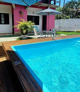 A piscina localizada em Pousada Pitaya Maresias ou nos arredores