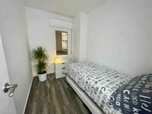 Postel nebo postele na pokoji v ubytování Cunit Vacation