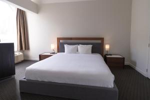 Krevet ili kreveti u jedinici u okviru objekta Adara Hotel