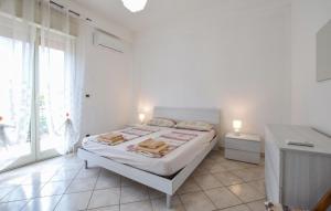 Katil atau katil-katil dalam bilik di 2 Bedroom Awesome Apartment In Capaci