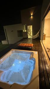 Galeri foto Refúgio com Spa Jacuzzi 40 min BH di Juatuba