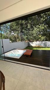 Galeri foto Refúgio com Spa Jacuzzi 40 min BH di Juatuba