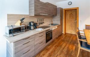 Kuchyň nebo kuchyňský kout v ubytování Attraktive Ferienwohnung Wagr,
