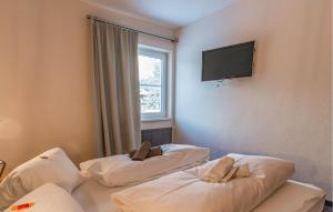 Postel nebo postele na pokoji v ubytování Attraktive Ferienwohnung Wagr,