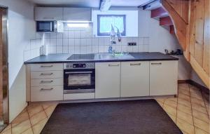 Kuchyňa alebo kuchynka v ubytovaní Großes Ferienhaus Dalaas