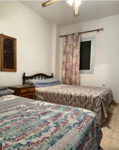 Postel nebo postele na pokoji v ubytování El Madyafa Chalet