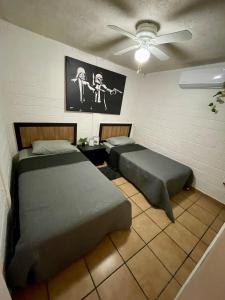 Postel nebo postele na pokoji v ubytování Villa del prado