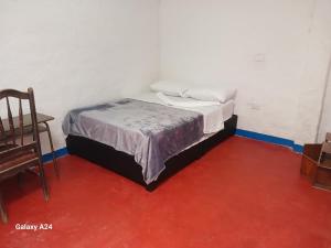 Postel nebo postele na pokoji v ubytování Hotel Deltoro + 10 fotografií