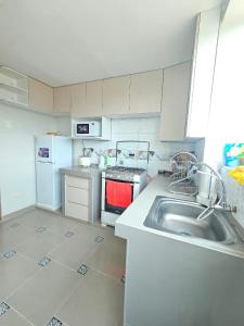 Kuchyň nebo kuchyňský kout v ubytování Departamento Orcorara