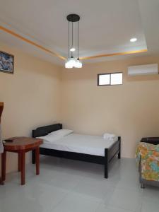 Ένα ή περισσότερα κρεβάτια σε δωμάτιο στο Hostal Rancho Sabor Isleño - Ometepe