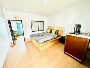Postel nebo postele na pokoji v ubytování บ้านทะเลสวย เกาะล้าน + 13 fotografií