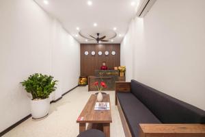 Ein Sitzbereich in der Unterkunft Kly Luxury Hotel
