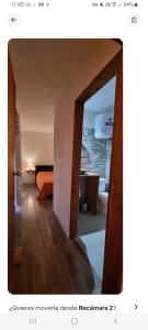 a room with a door open to a bedroom at Casa muy luminosa , 2 d in José Ignacio