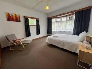 Krevet ili kreveti u jedinici u okviru objekta Spacious Retreat near Ferry & Mall