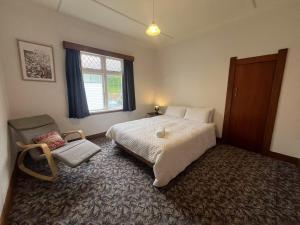 Krevet ili kreveti u jedinici u okviru objekta Spacious Retreat near Ferry & Mall