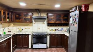 O bucătărie sau chicinetă la Económicas Habitaciones Privadas Cerca de Playa