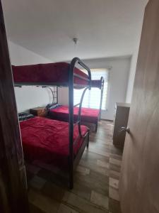 Cama o camas de una habitación en Cabañas don David