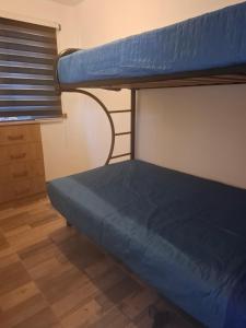 Cama o camas de una habitación en Cabañas don David