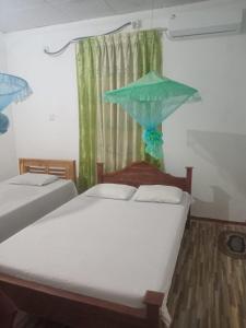 Postel nebo postele na pokoji v ubytování Green Villa