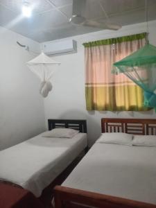 Postel nebo postele na pokoji v ubytování Green Villa + 2 fotografie